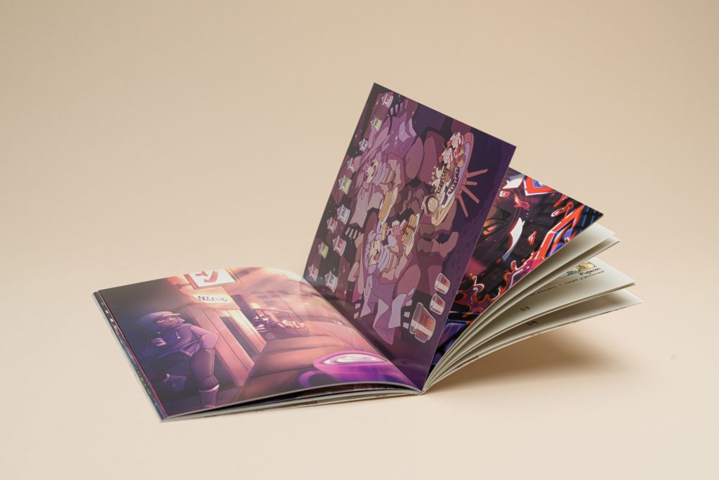 Saddle-stitched comic book open to glossy full-bleed pages with rich color and clean trim.