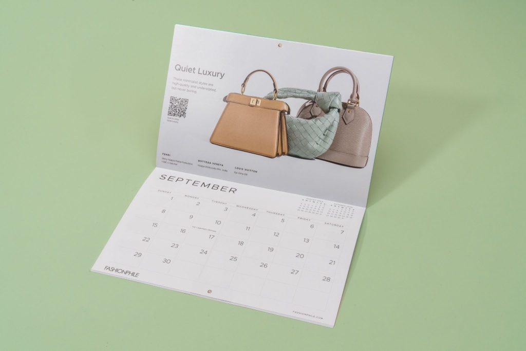 Branded custom wall calendar featuring photos of designer handbags minimalist layout