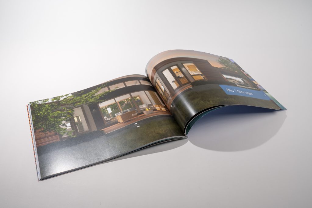 Glossy catalog opened on white background