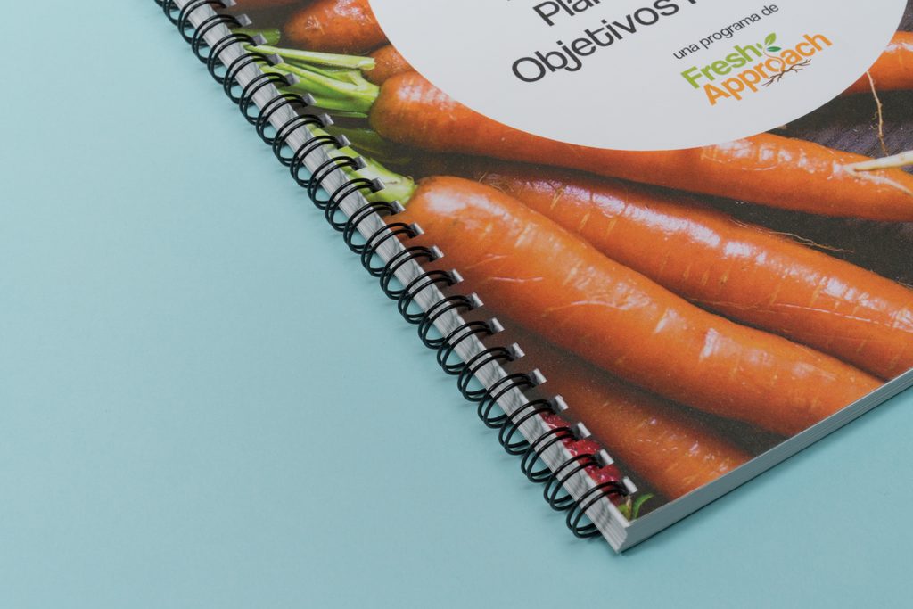 Spiral-bound cookbook in close up showing the coil binding